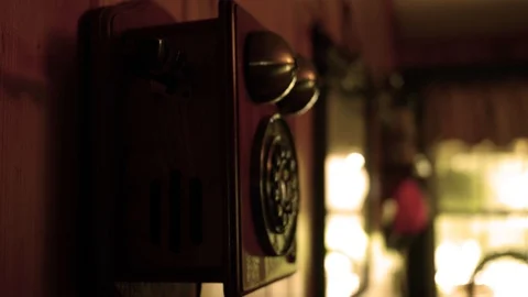 Hand picks up and hangs up old landline phone Stock Footage 95480786