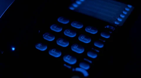 Hand picks up the black phone, dials Emergency Number 911 Stock-Footage 56258632