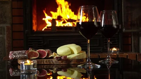 Hand picks up a glass of red wine Stock Footage 70032979