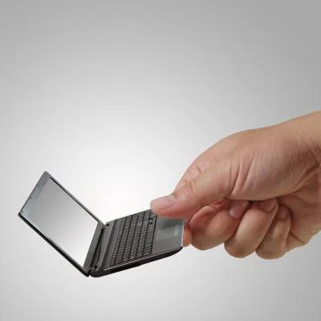 Hand picks laptop Stock Illustration