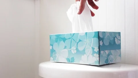 Hand picks out tissue from tissue box in modern bathroom Stock Footage 71252273