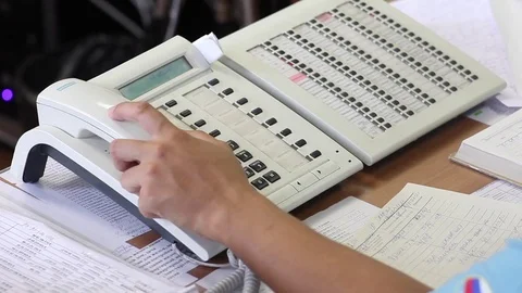 Hand Picks Up The Phone, Dials Numbers. Close Up Stock-Footage 82697139