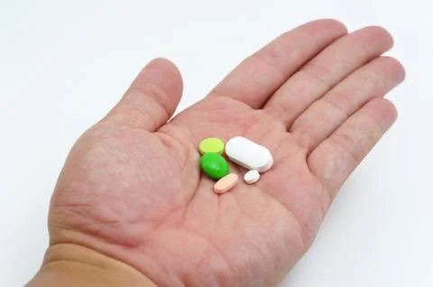 Hand with pills Foto stock