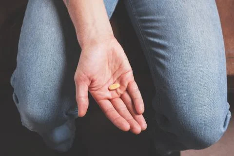 Hand with pills Foto stock