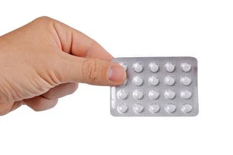 Hand with pills Stock Photos
