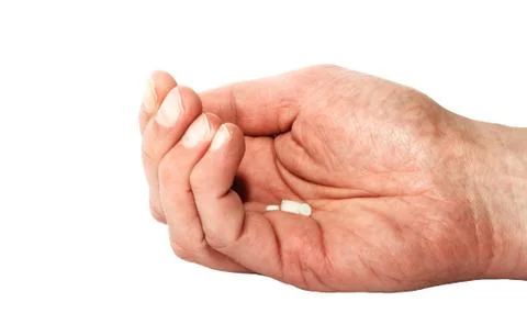 Hand with pills Stock Photos