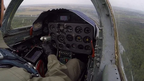 Hand of pilot hold and control helm. View of cockpit and dashboard close up. Stock Footage 118677706