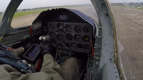 Hand of pilot hold helm. Plane climb up high in the sky. Cockpit close up. Stock Footage 118677642