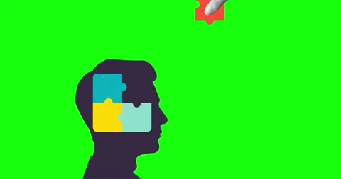 A hand places the missing puzzle piece into a person's head Stock Footage 314421954