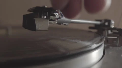 Hand Placing And Removing Stylus From A Record On The Turntable. Stock Footage 265073866