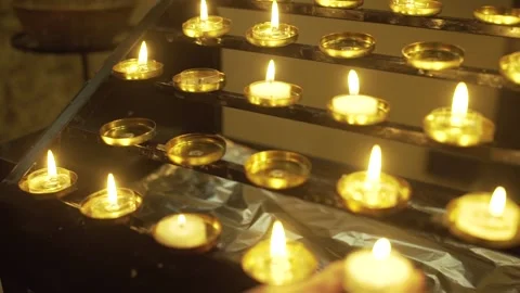 Hand placing candle Stock Footage 133573842