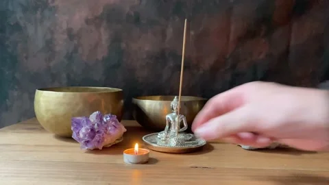Hand placing candles on a Buddhist altar. Stock Footage 225878607