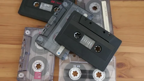 Hand is placing down the old audio tape 스톡 동영상 136386563