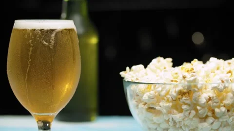 Hand placing glass of beer Stock Footage 140355152