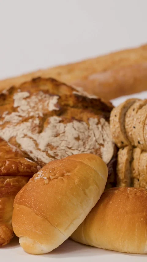 Hand Placing Sliced Whole Wheat Bread Stock Footage 337224919