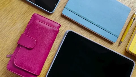 Hand Placing a Tablet and Wallet on a Table – Casual Modern Lifestyle Scene Video stock 309851289