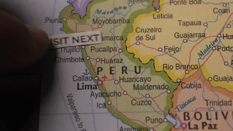 Hand Placing Visit Next Text Label on Peru Map Stock Footage 346432664