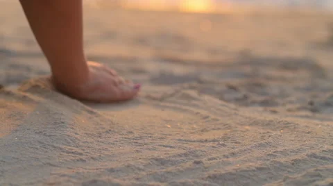 Hand plaing with sand on beach Stock Footage 66371845