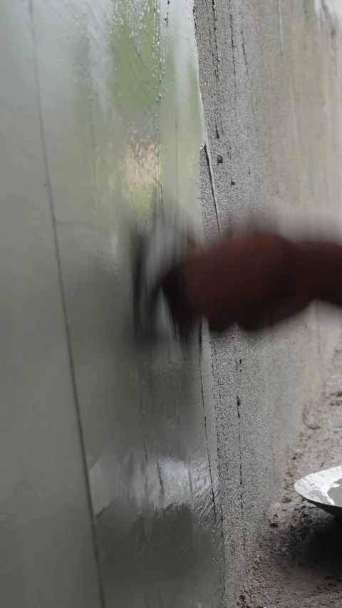 Hand Plastering Stock Footage 340760132