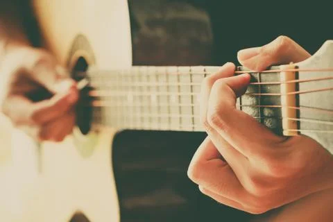 Hand play guitar Stock Photos