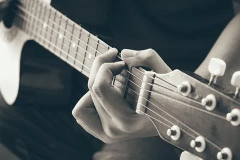 Hand play guitar Stock Photos