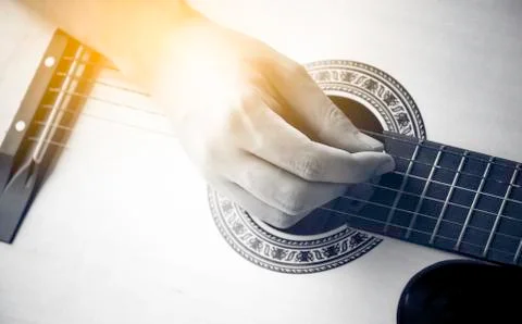 Hand play guitar Stock Photos