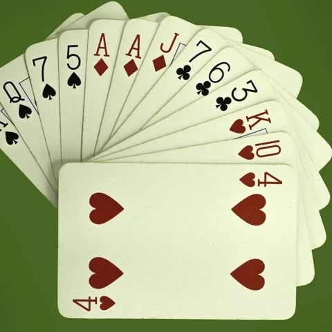 Hand of playing cards turning (including two ace of diamonds) 스톡 동영상 229671035