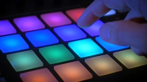 Hand playing on drum computer and synthesizer Stock-Footage 107383528