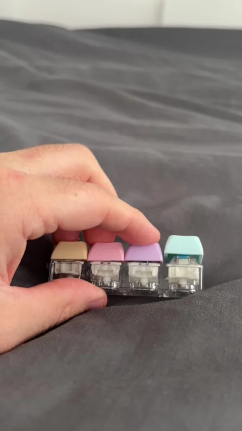 Hand Playing With Fidget Keyboard Toy for Stress Relief Stock Footage 337468966