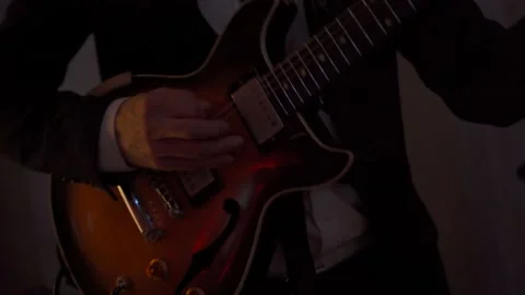 Hand playing guitar, close up Stock Footage 146243794