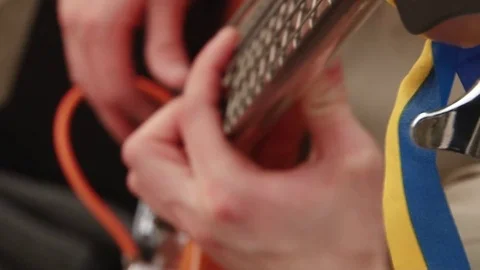 Hand playing guitar Stock Footage 70363632