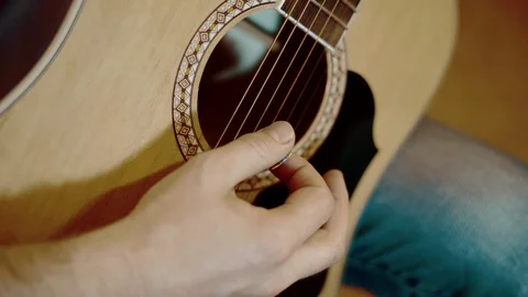 Hand playing the guitar Stock Footage 91717265