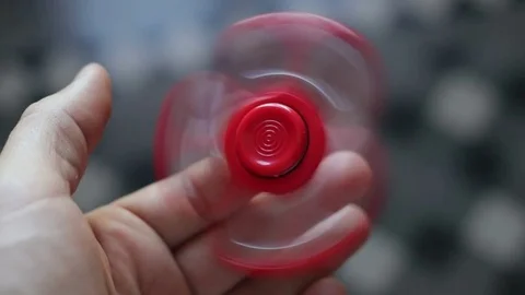 Hand playing spinner Stock Footage 75642156