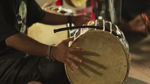 Hand playing traditional frame drum tambourine 库存影片 345860339