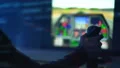 The hand plays in computer game with a joystick. evening night time 4k or 4k+ Resolution