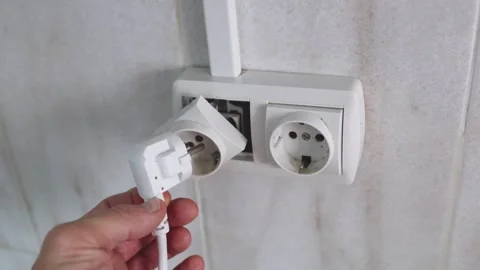 In Hand Is a Plug for Connecting to a Socket But the Socket is Broken Stock Footage 310173318