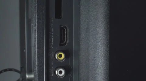 Hand Plugging HDMI Cable Into A HDTV Side, Television, Cables, Network Stock Footage 37331731