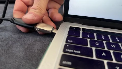 Hand plugging USB device into laptop port, computer connection and data transfer Stock Footage 337121514