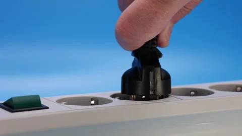 Hand Plugs The Plug Into An Extension Cord Socket And Turns On The Button. 4k, 6 스톡 동영상 244792641