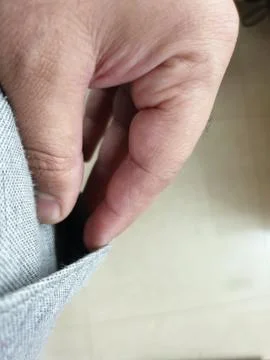Hand in pocket Stock Photos