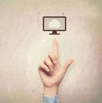 Hand pointing to Cloud Computer concept Stock Photos