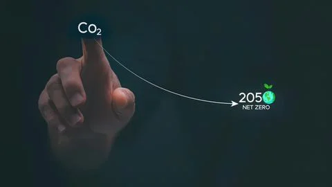 Hand pointing to co2 and net zero with green leaf icon Stock Photos