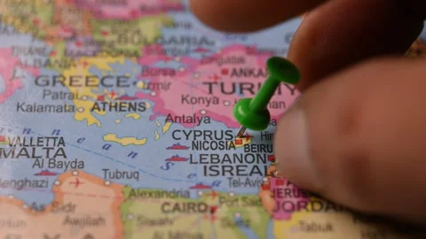 Hand Pointing Cyprus Location with Green Pin on World Map 4K 60fps Stock Footage 333570369