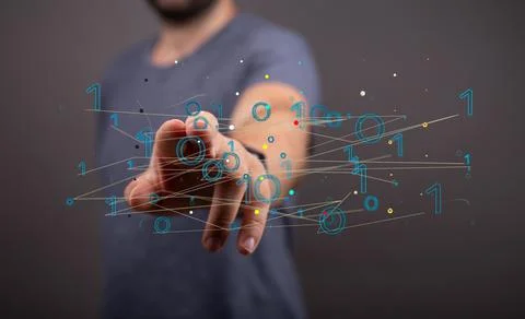 Hand pointing to digital binary codes - the concept of lines and futuristic data Stock Photos