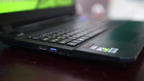 Hand pointing at input-output (IO) port of modern laptop Video stock 158735839