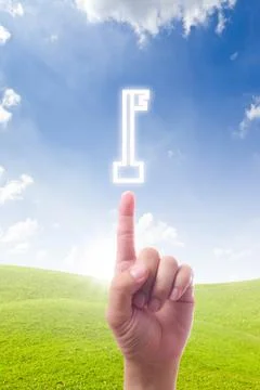 Hand pointing to the key Stock Photos