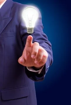 Hand pointing light bulb Stock Photos