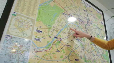 Hand pointing on Paris map Stock Footage 46384677