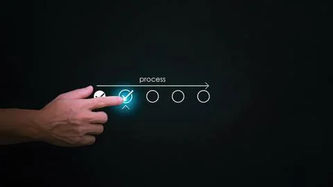 Hand pointing at process steps on digital interface Stock Photos