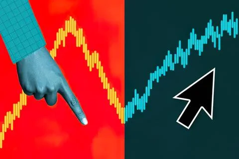 Hand pointing at rising and falling stock market graphs Stock Photos